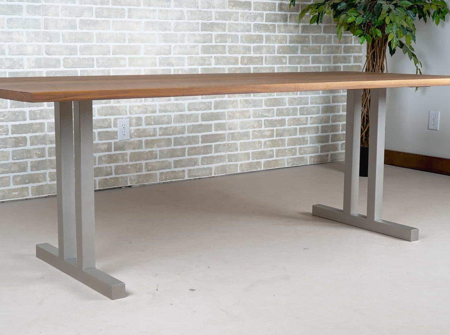 walnut dining table on nickel tuttle legs