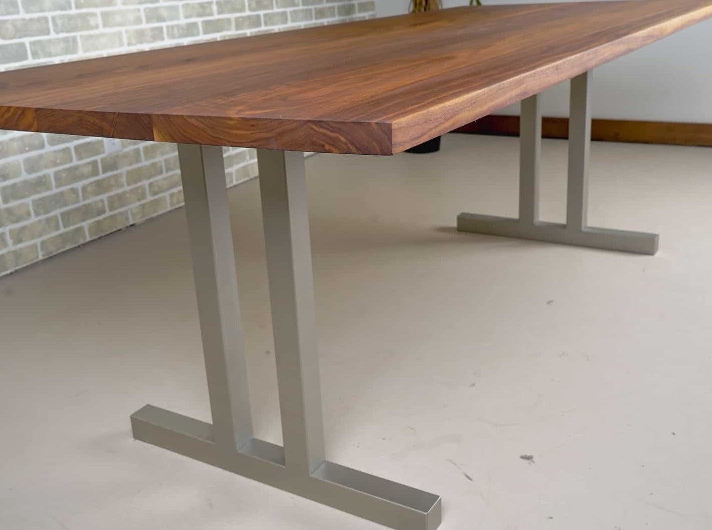 walnut dining table on nickel tuttle legs