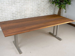 walnut dining table on nickel tuttle legs