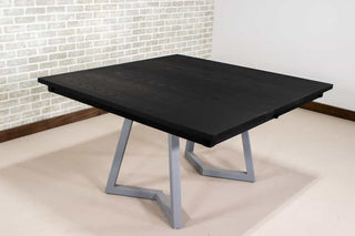 black extending table on silver steel legs