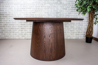 round oak table in espresso on cone pedestal base