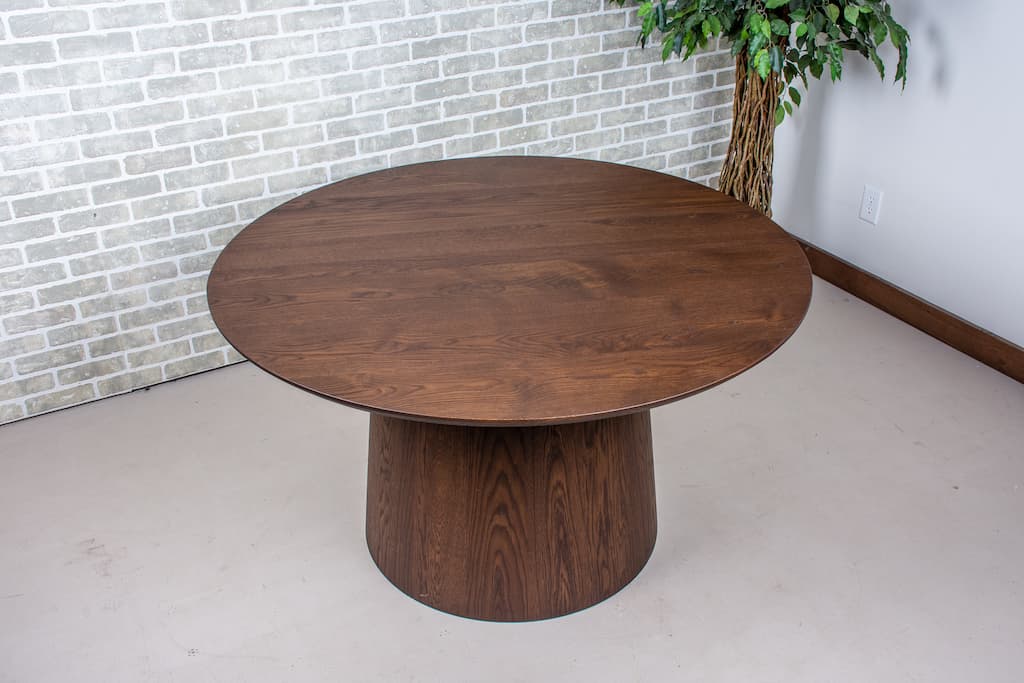 round oak table in espresso on cone pedestal base