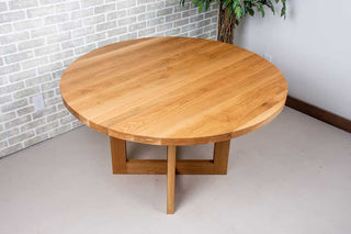 round oak table on cross base