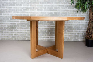 round oak table on cross base