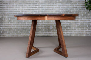 walnut round extendable table on wood legs
