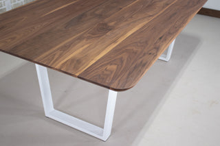 walnut table with stingray edge on white steel legs