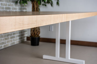 large scandinavian maple table on white legs