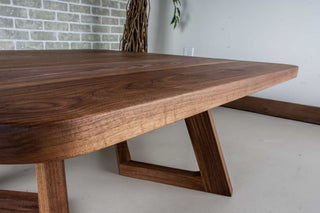 square walnut coffee table on wood legs