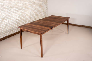 extendable mid century table made of walnut