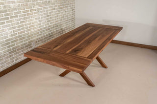 walnut expandable table on upside down Y base