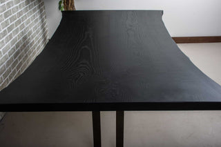 live edge black ash bookmatch table on steel gunmetal Tuttle legs
