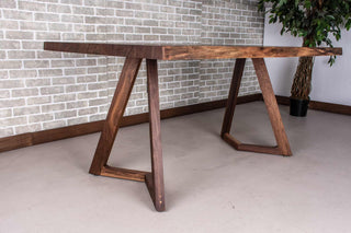 calm live edge walnut table on walnut legs
