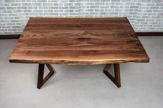 calm live edge walnut table on walnut legs