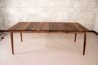 extendable mid century table made of walnut