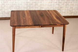 extendable mid century table made of walnut