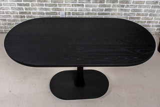 Black stained ash racetrack oval Jarvis dining table.