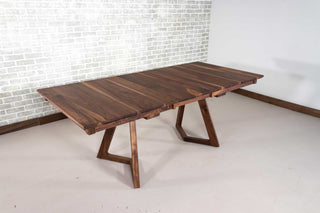 walnut center extension table on wood legs
