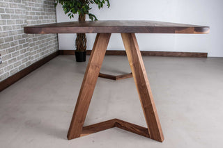 midcentury modern table in walnut with rounded corners