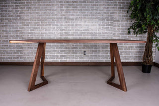 midcentury modern table in walnut with rounded corners