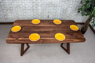 midcentury modern table in walnut with rounded corners