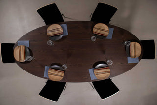 Elliptical oval oak table on a cone base in espresso