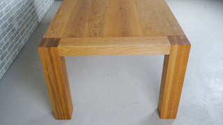 oak parsons table with breadboard end