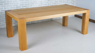 oak parsons table with breadboard end