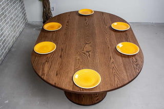 oval oak table on pedestal base