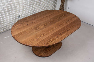 oval oak table on pedestal base