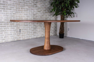 oval oak table on pedestal base