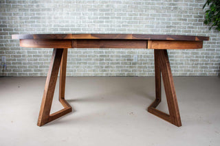 round walnut center extension table with square edge on wood legs