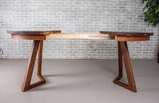 round walnut center extension table with square edge on wood legs