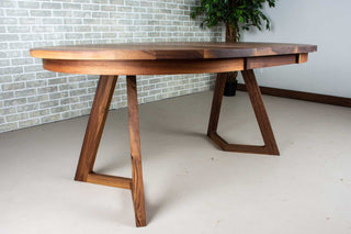 round walnut center extension table with square edge on wood legs