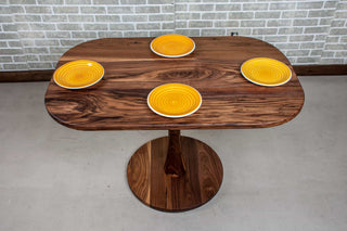small walnut table on pedestal base