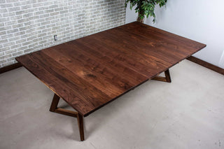 square walnut extension table with 18" leaves