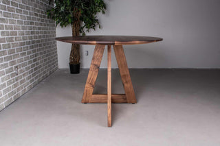 walnut ellipse table with thin edge on cross base