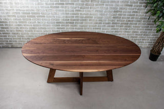 walnut ellipse table with thin edge on cross base