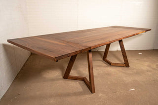 walnut end extension table with square edge on wood legs