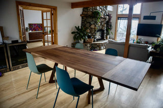 walnut end extension table with square edge on wood legs