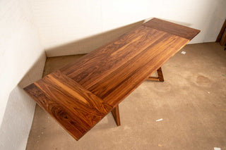 walnut end extension table with square edge on wood legs