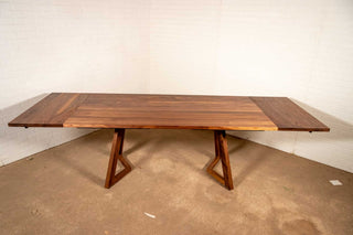 walnut end extension table with square edge on wood legs