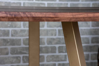 walnut squoval dining table on gold chandler legs