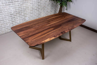walnut squoval dining table on gold chandler legs