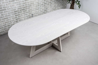 white oval oak racetrack table on moraine pedestal base